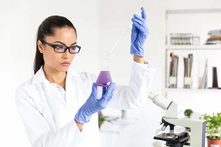 microbiologist working at laboratoy